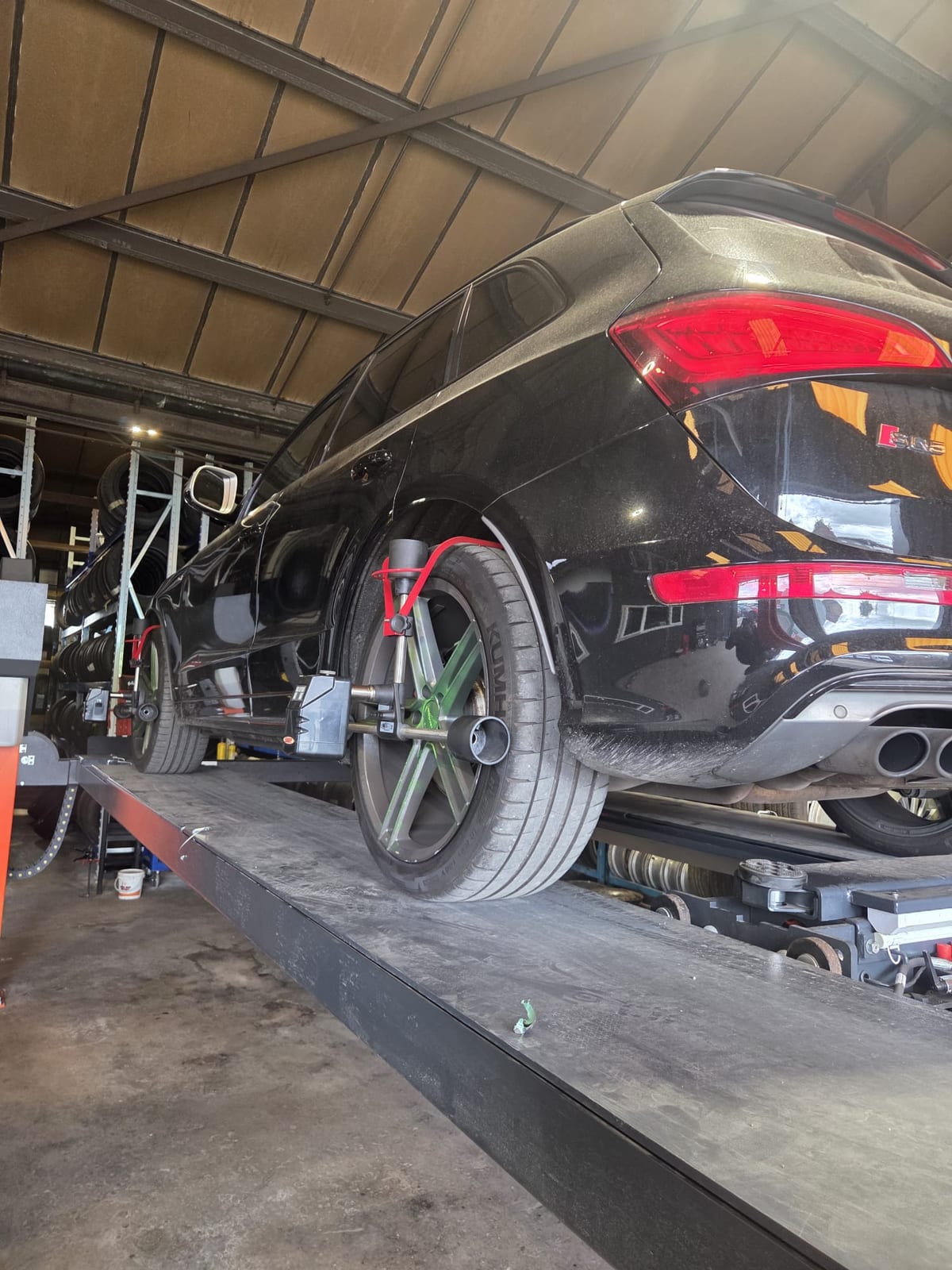 Alignment sensors fitted to a car on our alignment ramp